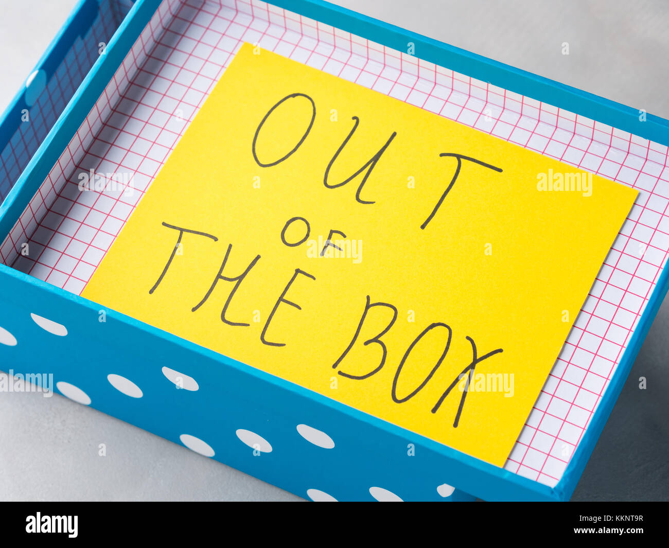 Think out of box creativity concept yellow card Stock Photo Alamy
