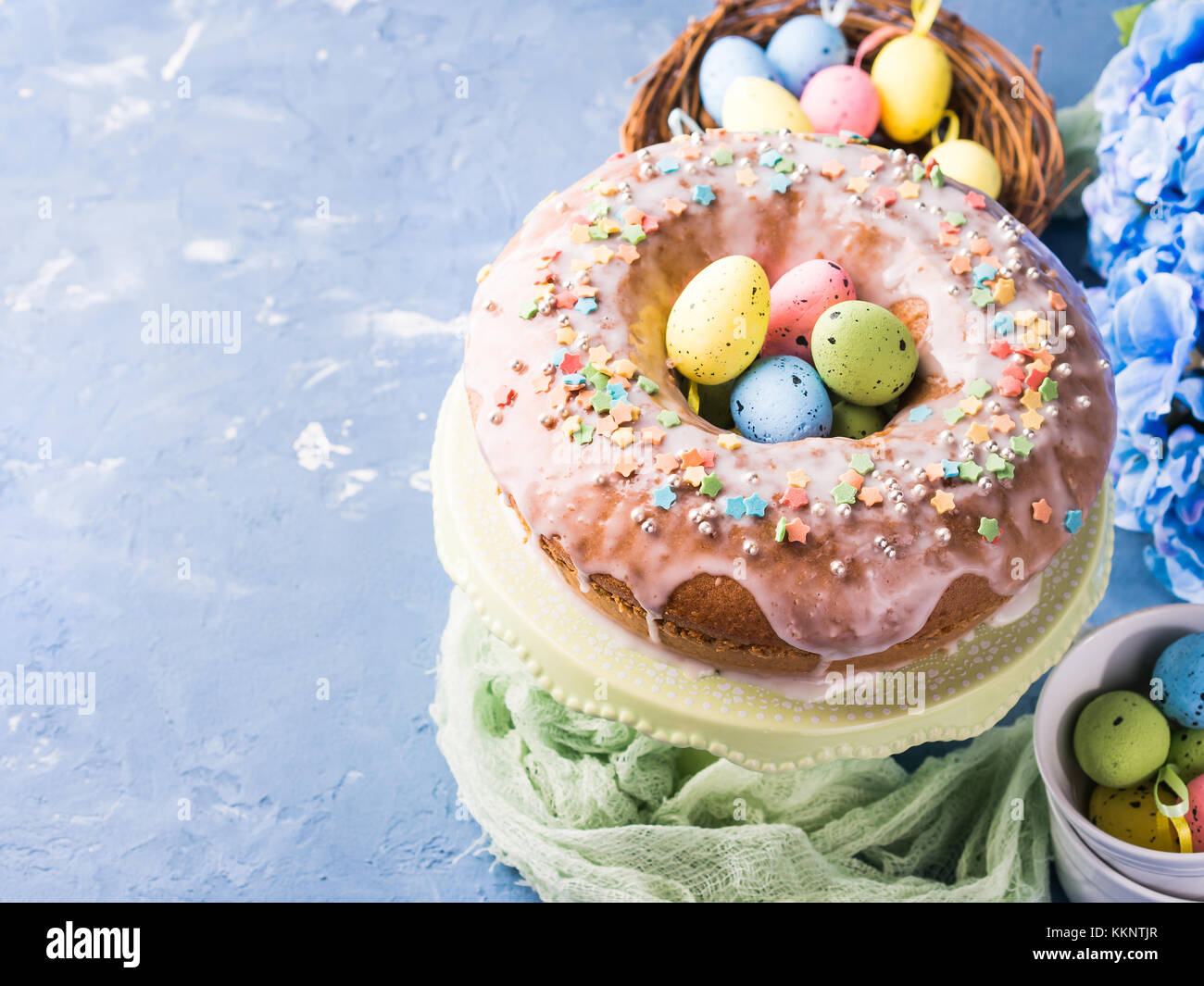 Easter bundt ring cake with sugar frosting sprinkles decorations eggs ...