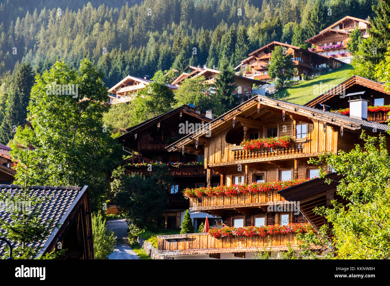 Balconies with flowers in Alpbach, a town in western Austria in the state of Tyrol Stock Photo