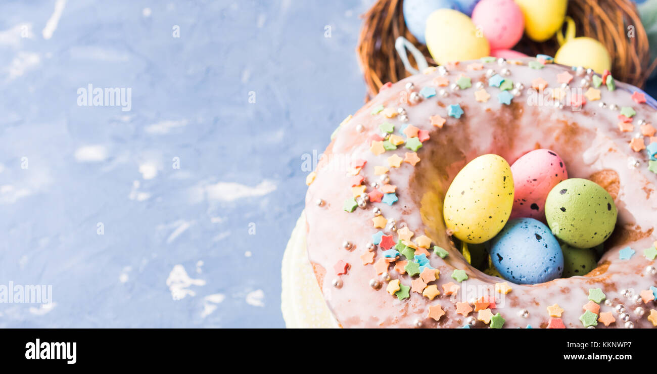Easter bundt ring cake with sugar frosting sprinkles decorations eggs ...