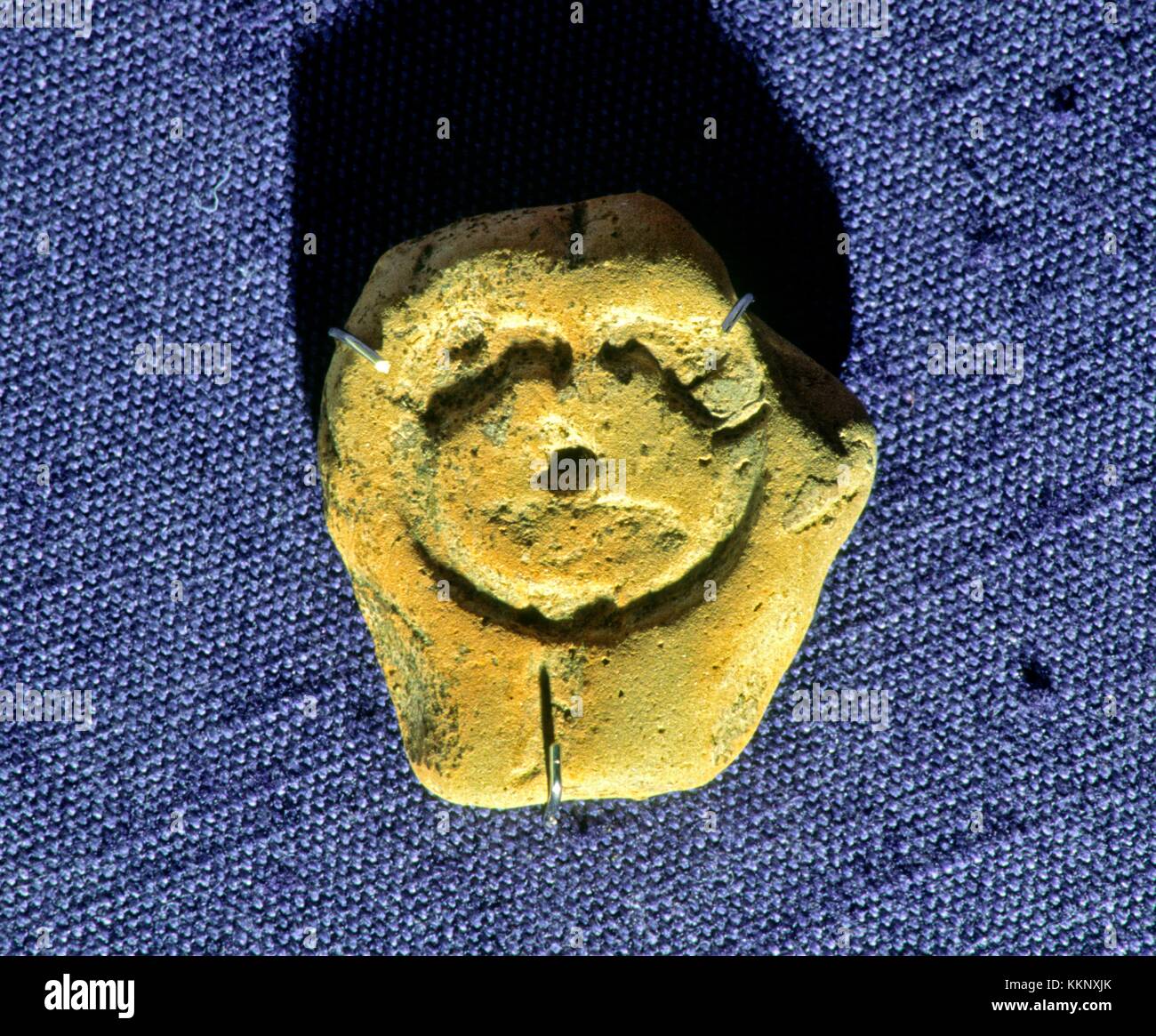 Earthenware mould for silver Celtic bird head penannular brooch. Found at Dunadd Fort. Kilmartin House Museum, Argyll, Scotland Stock Photo