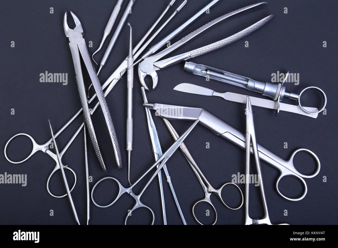 Round Doctors Instruments Medical and surgery instruments isolated in black mirror background ...