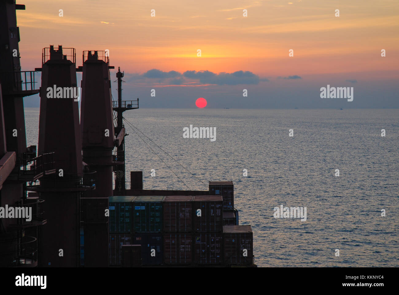 Container ship sea sunset hi-res stock photography and images - Alamy
