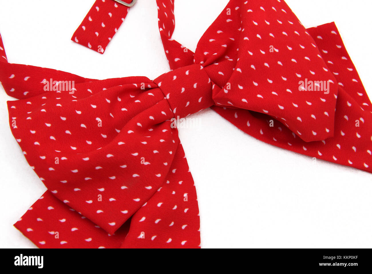 Red Bow Tie with White Spots Stock Photo
