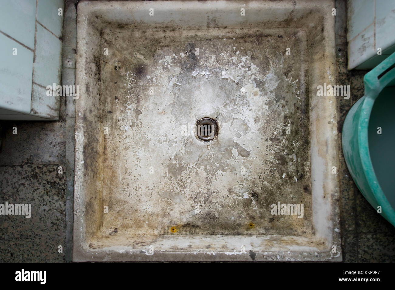 Metal drain hole in the ceramic grungre shower tray Stock Photo Alamy