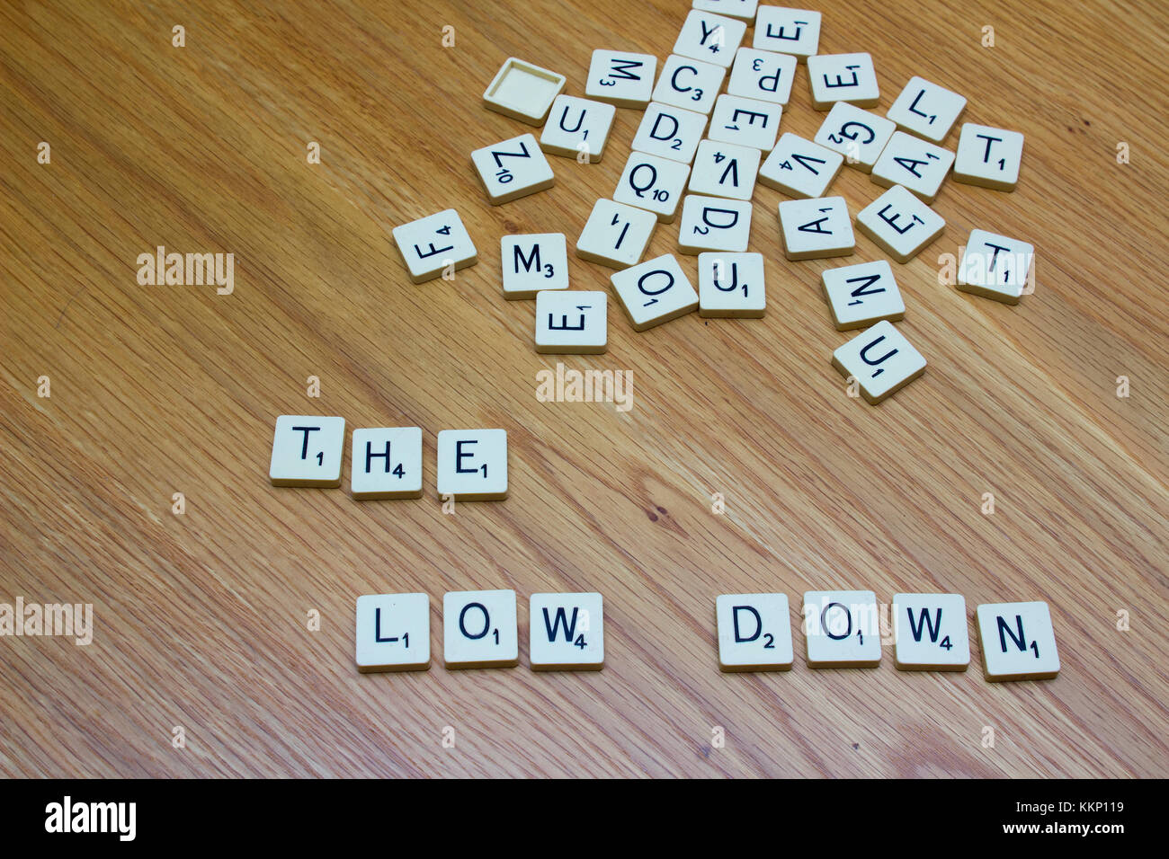 1 December 2017 Ivory board game letters saying The Low Down on an oak