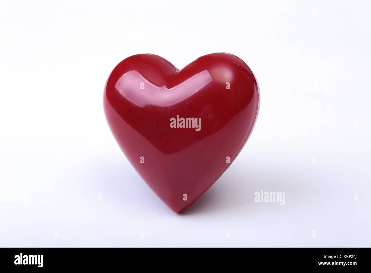 A red heart isolated on white background Stock Photo - Alamy