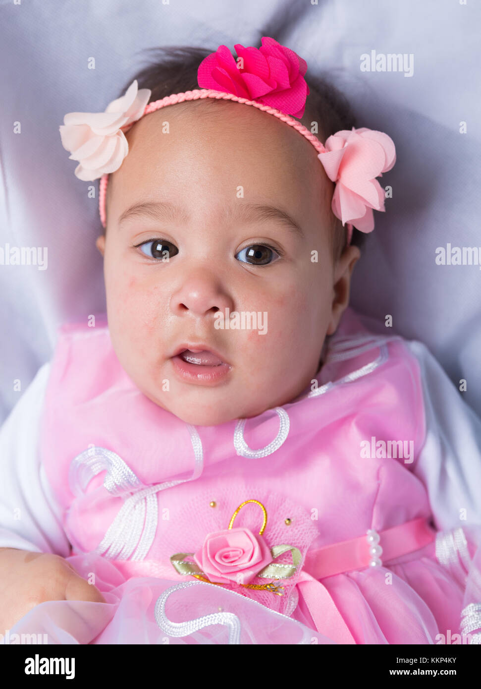 portrait of a cute newborn baby girl in a pink dress Stock Photo Alamy