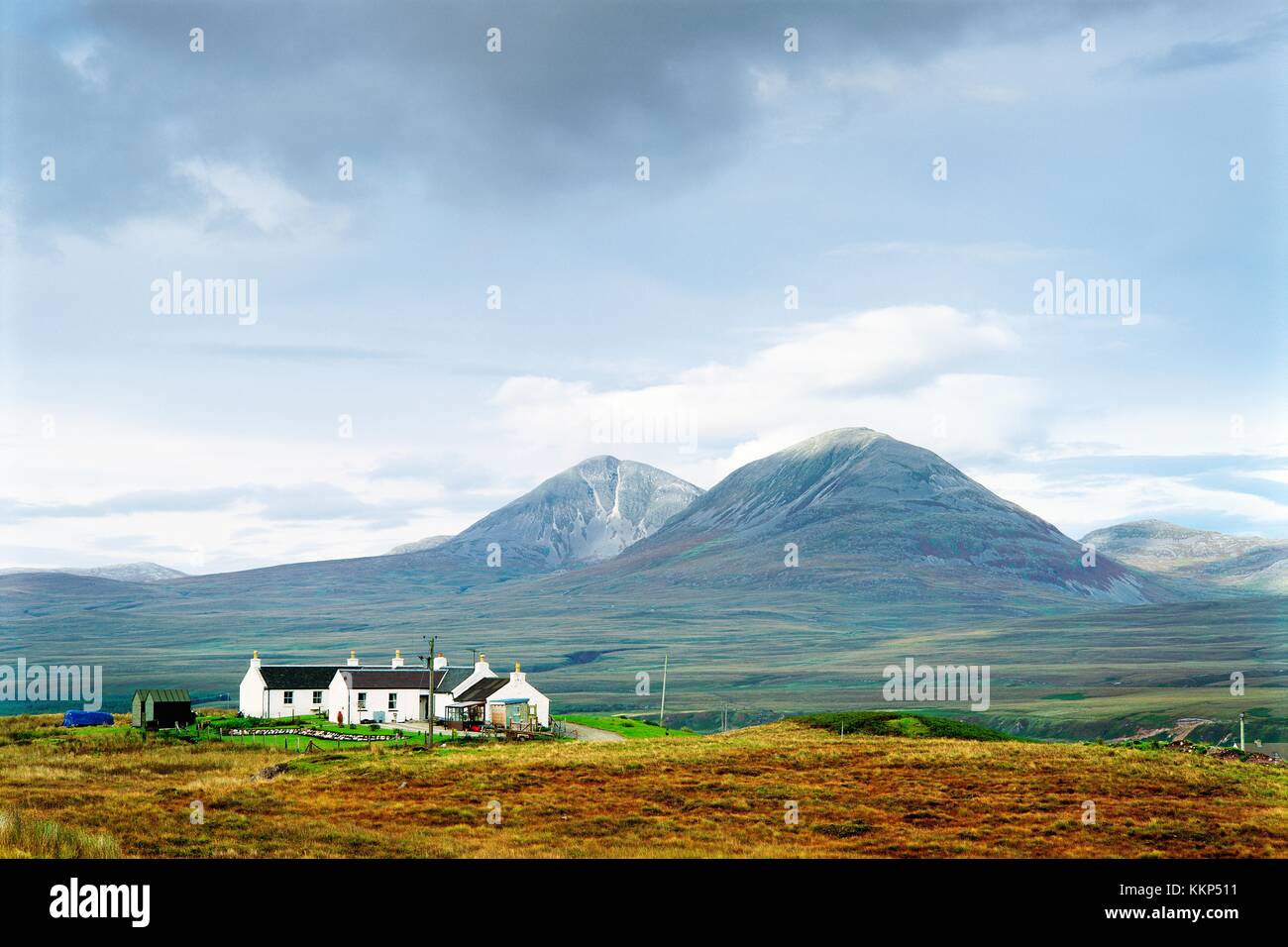 The Paps of Jura mountains on the Isle of Jura seen behind cottage on