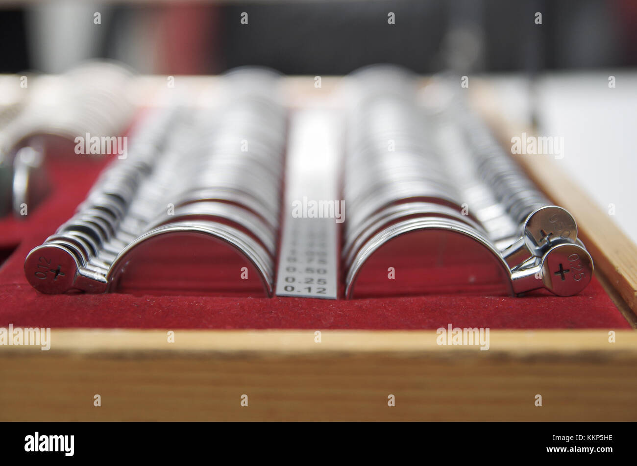 Close up of metallic object used for take the size of the glasses inside of optical in a blurred background Stock Photo