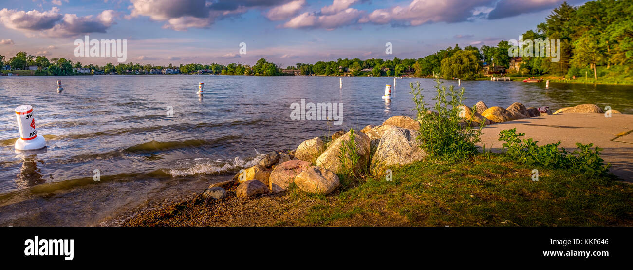 Early evening in the summer on the shore at Goguac Lake in Battle Creek, Michigan Stock Photo