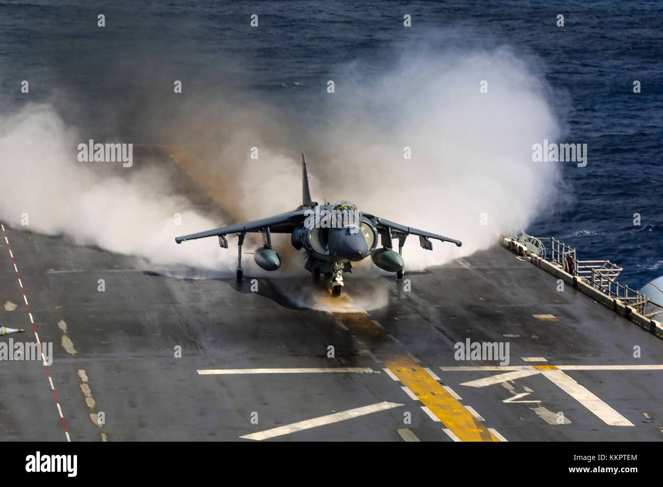 A U.S. Marine Corps AV-8B Harrier II ground-attack aircraft takes off from the flight deck of the U.S. Navy Wasp-class amphibious assault ship USS Iwo Jima November 24, 2017 in the Atlantic Ocean.  (photo by Jon Sosner via Planetpix) Stock Photo