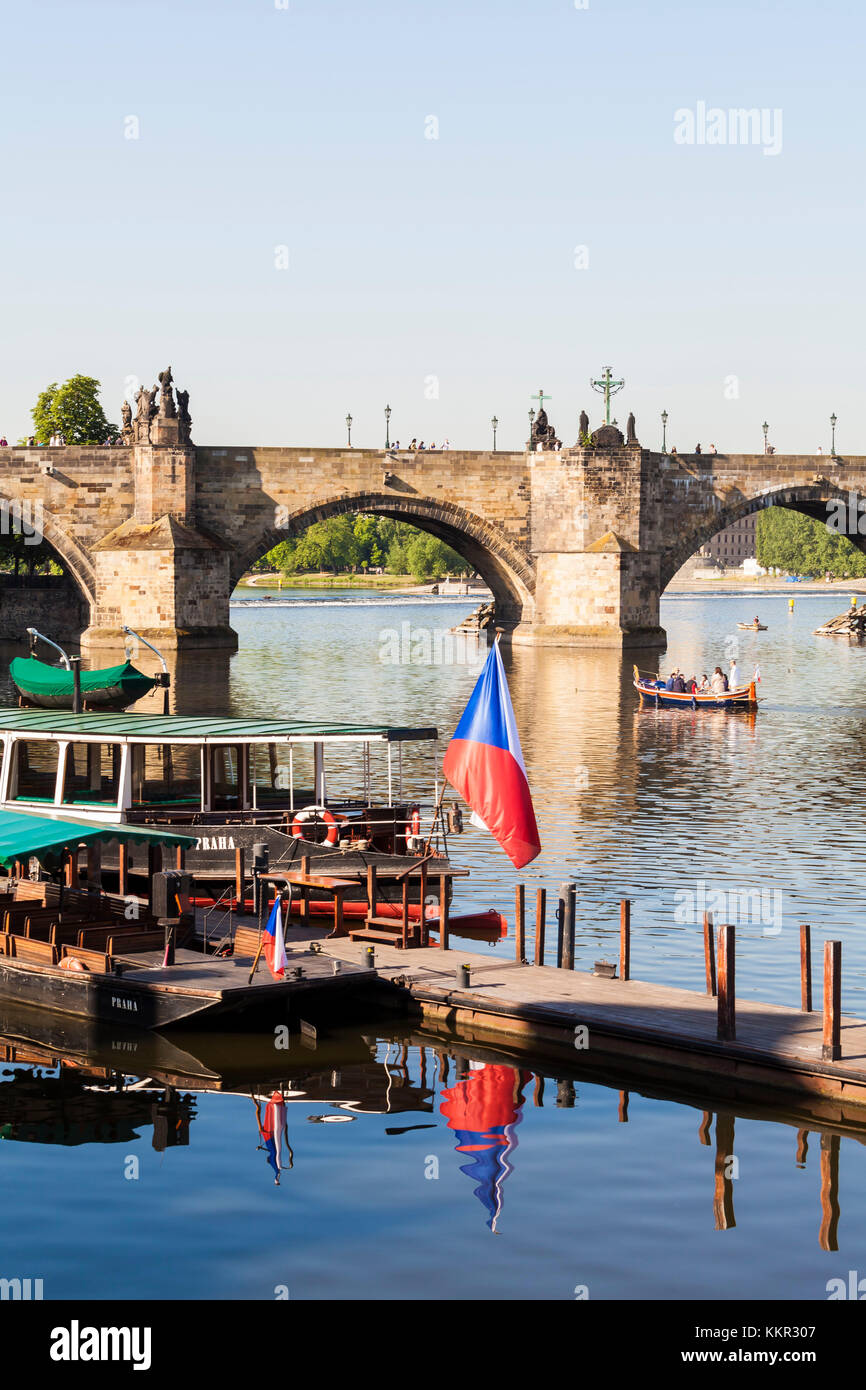 Czechia, Prague, Vltava, Charles Bridge, excursion boats, boat, Czech flag Stock Photo