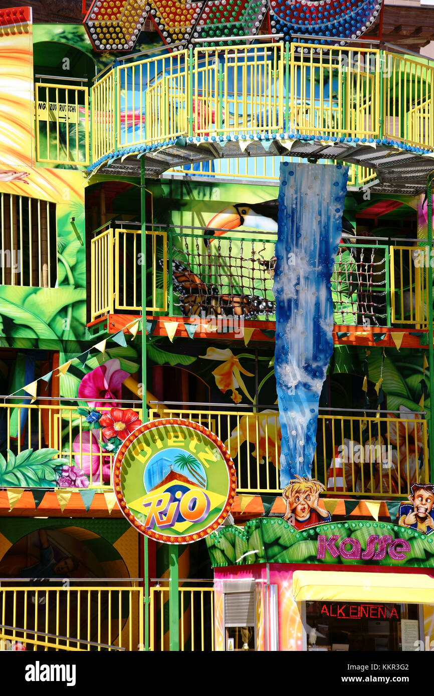 The colourful facade of an adventure course for children on a funfair in Mainz. Stock Photo