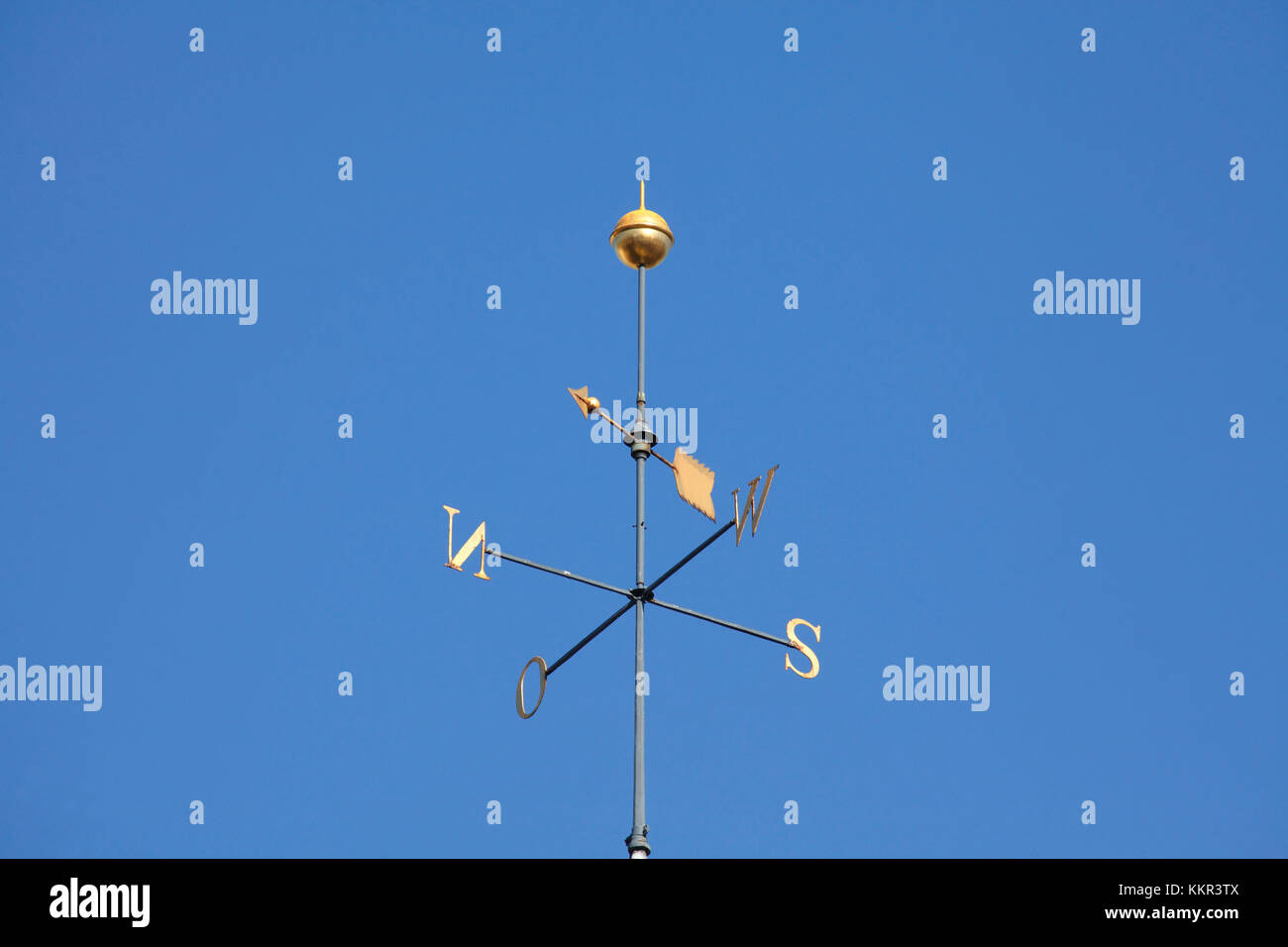 Golden weather vane on a steeple hires stock photography and images