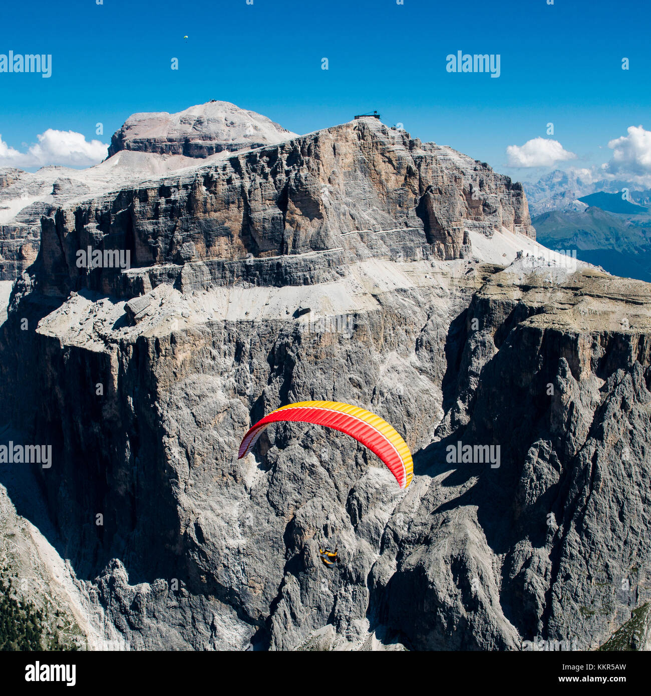 Dolomites, paraglider above cliff faces of the Sella group, Piz Selva, Piz Boe, Val Lasties, aerial picture, Trentino, South Tirol, Italy Stock Photo