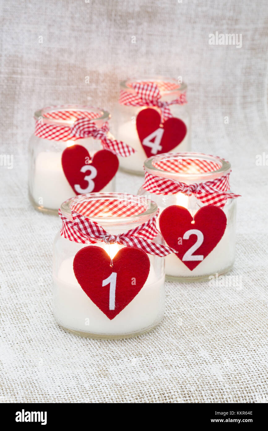 Advent candles in glasses, still life Stock Photo Alamy