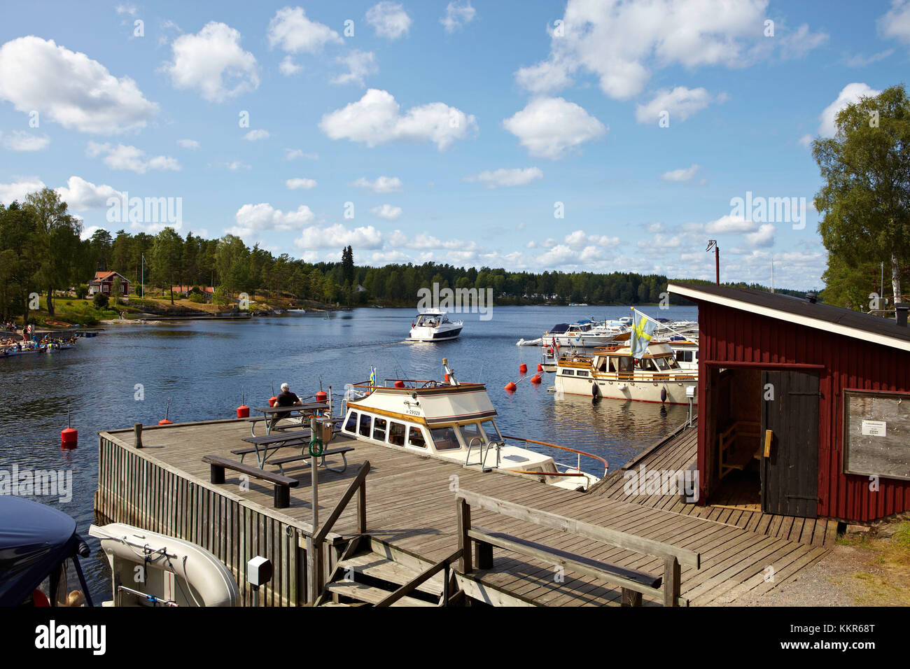 Boats in the harbour, Lennartsfors by the Dalsland Canal, on Lelång Lake, Dalsland, Värmlands län, Sweden Stock Photo