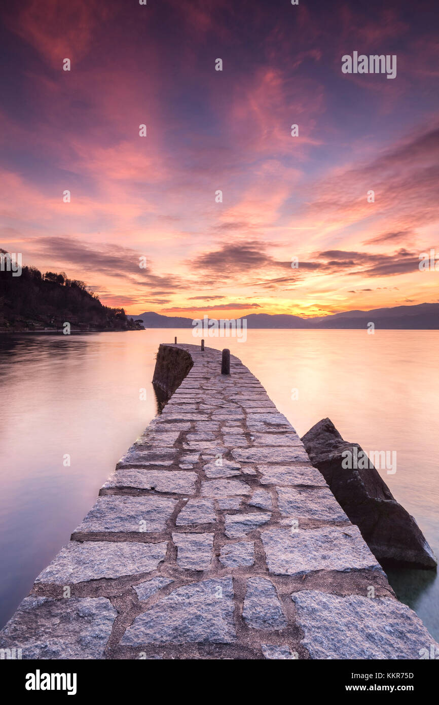 Sunset at the old pier, Lake Maggiore, Ispra, Varese Province, Lombardy, Italy. Stock Photo