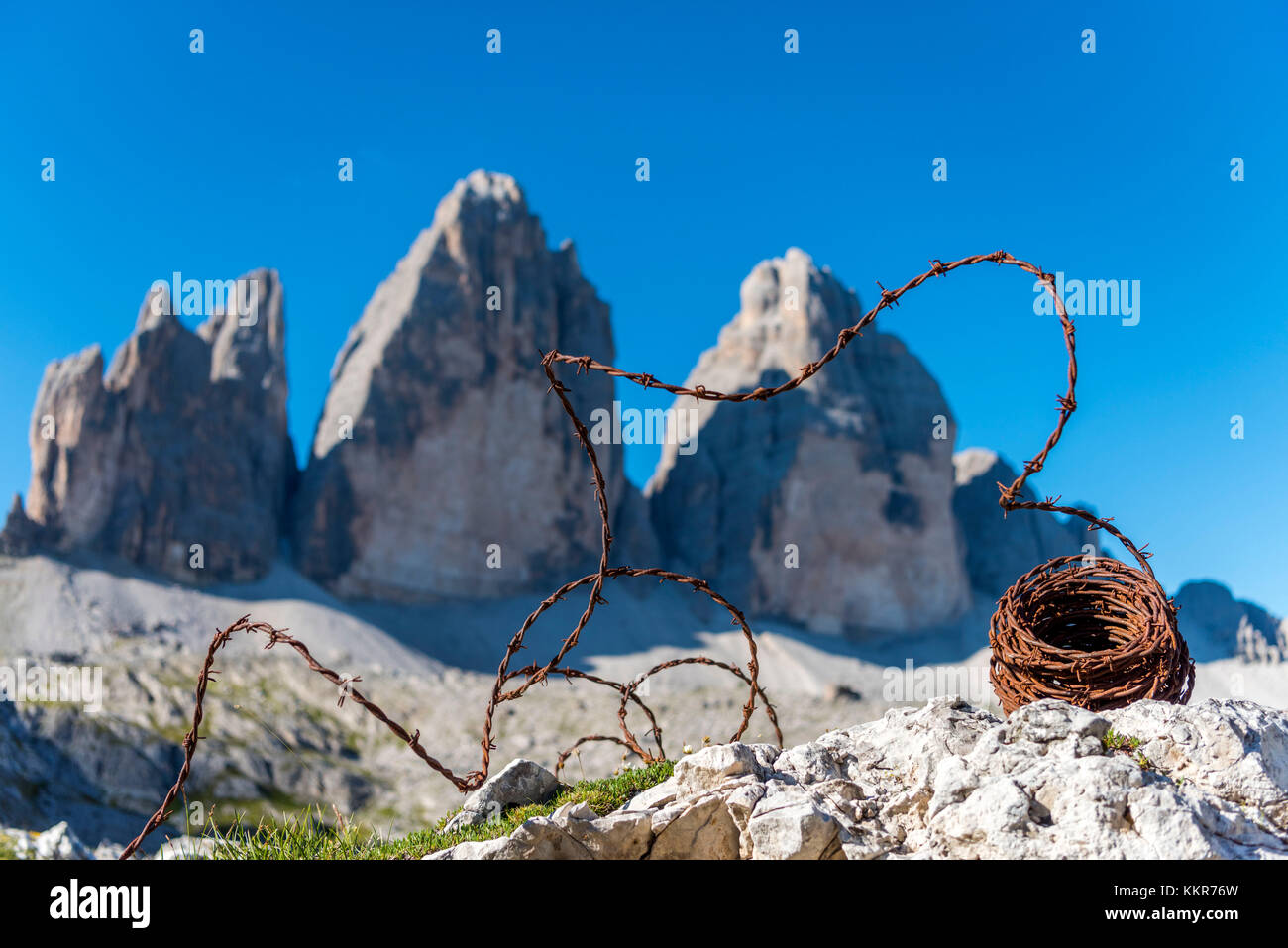 Sesto / Sexten, province of Bolzano, Dolomites, South Tyrol, Italy. Barbed wire from the First World War in front of the Three Peaks of Lavaredo Stock Photo