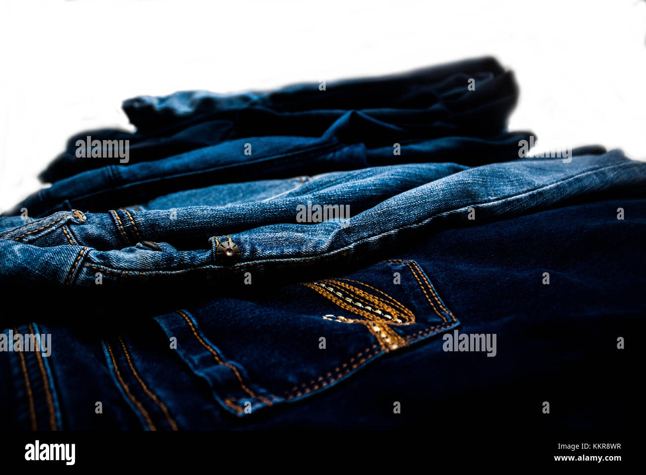 A Spread of Various Colors of Blue Jeans Stock Photo - Alamy