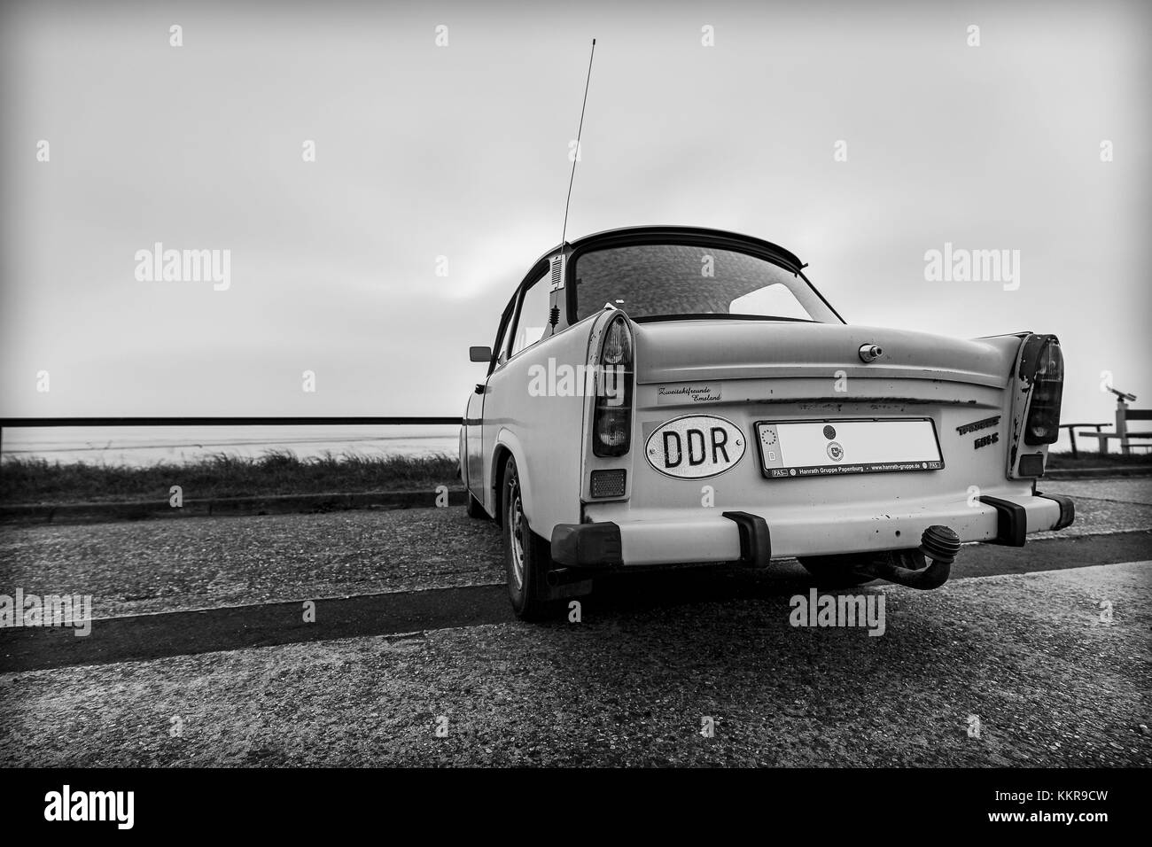 An old Trabant on the coast of Eastfrisia Stock Photo