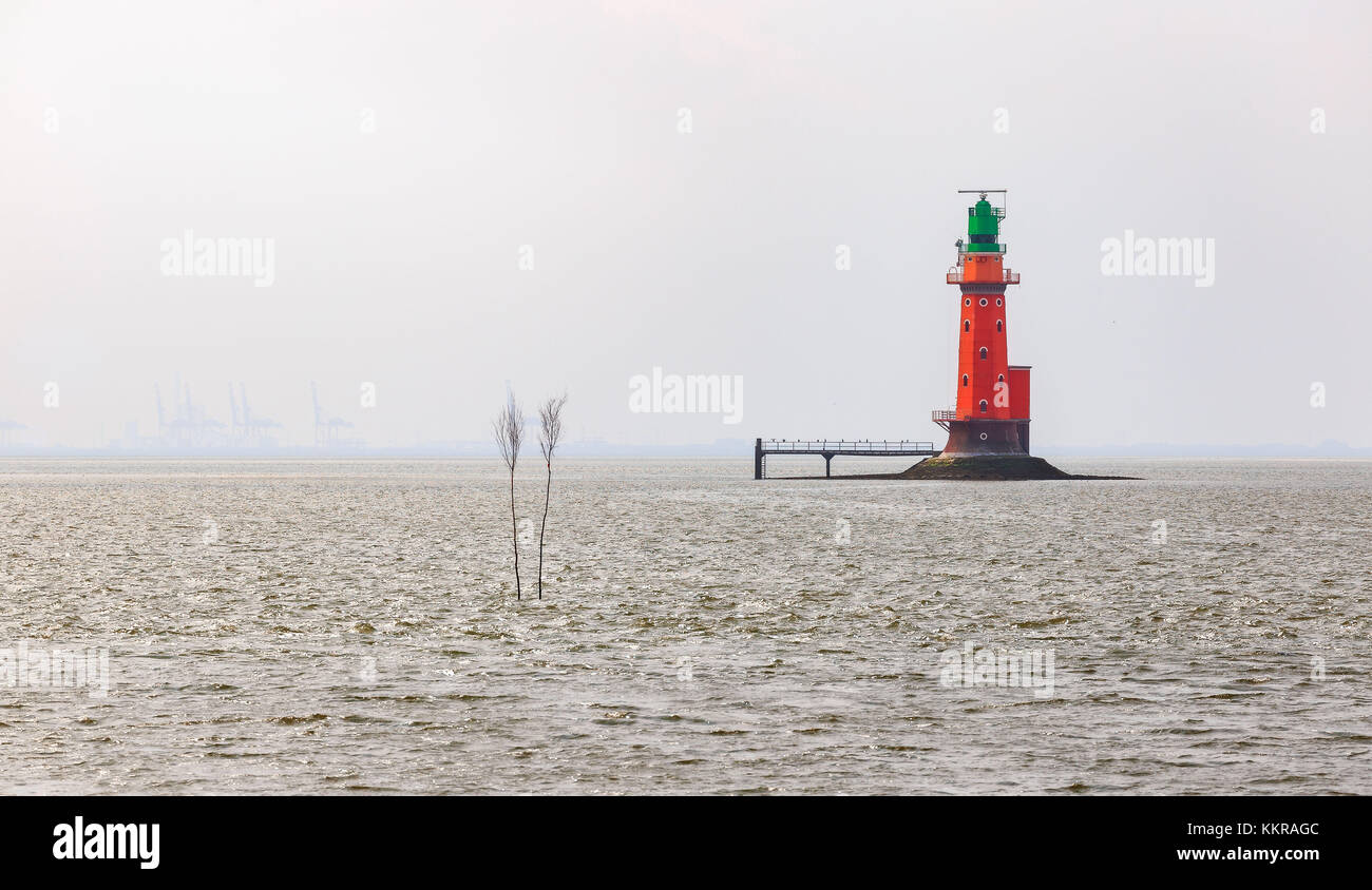 The lighthouse Hohe Weg in the wadden sea in the region of the Außenweser. Stock Photo