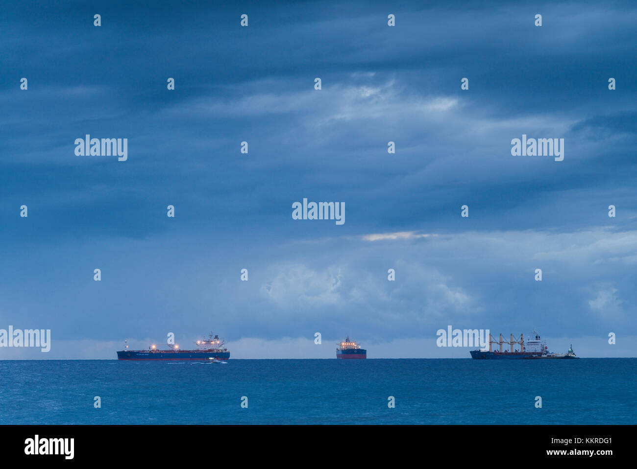 Netherlands, Sint Eustatius, Oranjestad, Oranjestad Bay, oil tankers, dusk Stock Photo