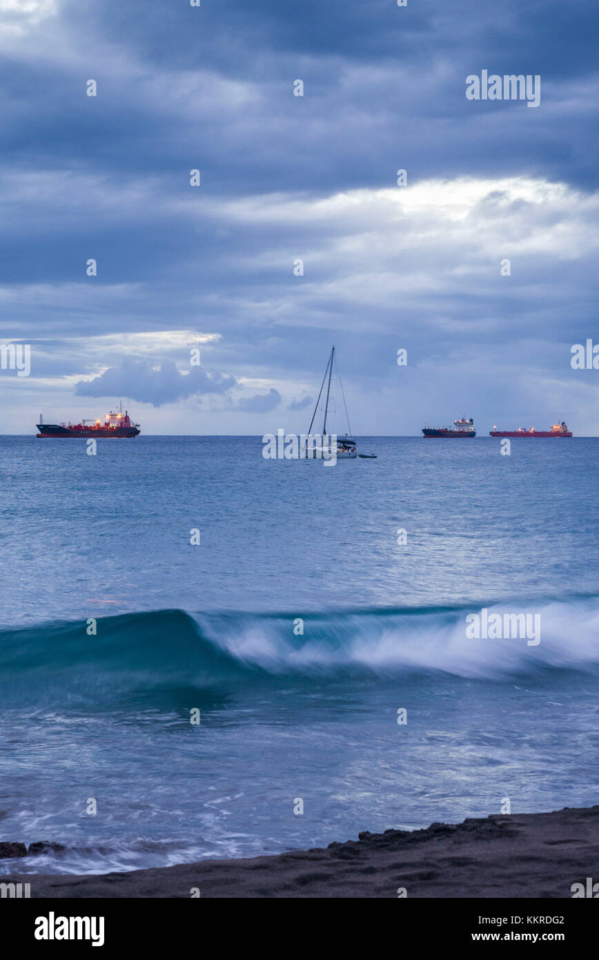 Netherlands, Sint Eustatius, Oranjestad, Oranjestad Bay, oil tankers, dusk Stock Photo