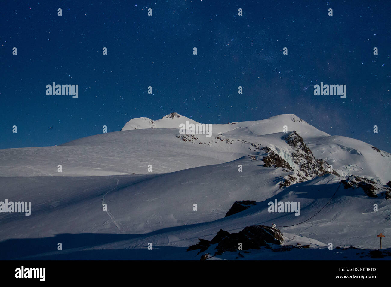 Cevedale mount, Central Alps, Lombardy, Italy. Cevedale mount in a moony night under starring sky. Stock Photo