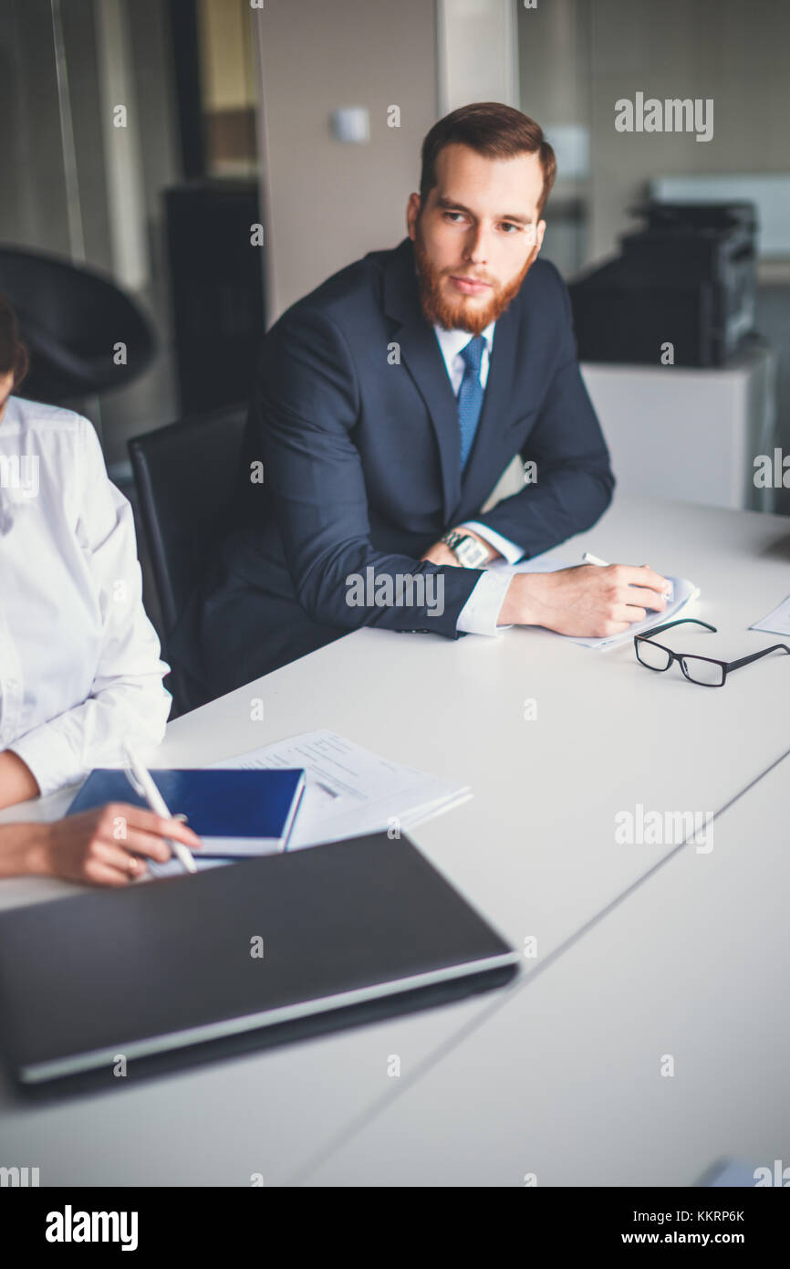 Handsome smiling confident businessman portrait Stock Photo - Alamy