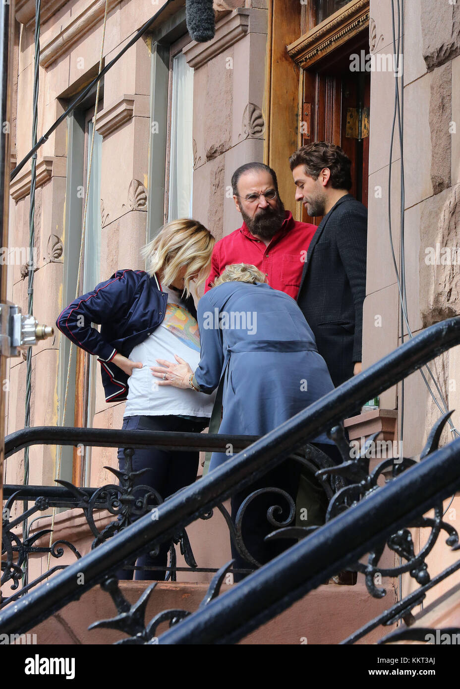 NEW YORK, NY - MARCH 22: Olivia Wilde, Mandy Patinkin and Oscar Isaac were on the set of the new movie 'Life Itself' on March 21, 2017 in New York City People: Olivia Wilde, Mandy Patinkin, Oscar Isaac Stock Photo