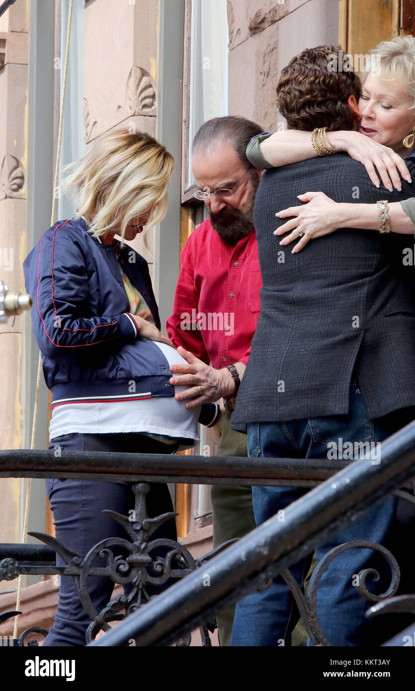 NEW YORK, NY - MARCH 22: Olivia Wilde, Mandy Patinkin and Oscar Isaac were on the set of the new movie 'Life Itself' on March 21, 2017 in New York City People: Olivia Wilde, Mandy Patinkin, Oscar Isaac Stock Photo