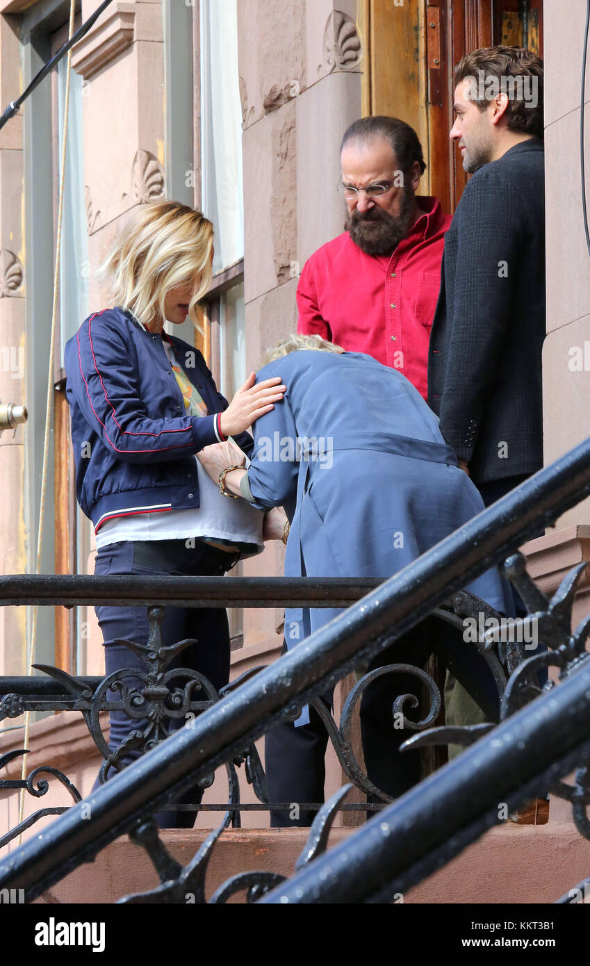 NEW YORK, NY - MARCH 22: Olivia Wilde, Mandy Patinkin and Oscar Isaac were on the set of the new movie 'Life Itself' on March 21, 2017 in New York City People: Olivia Wilde, Mandy Patinkin, Oscar Isaac Stock Photo