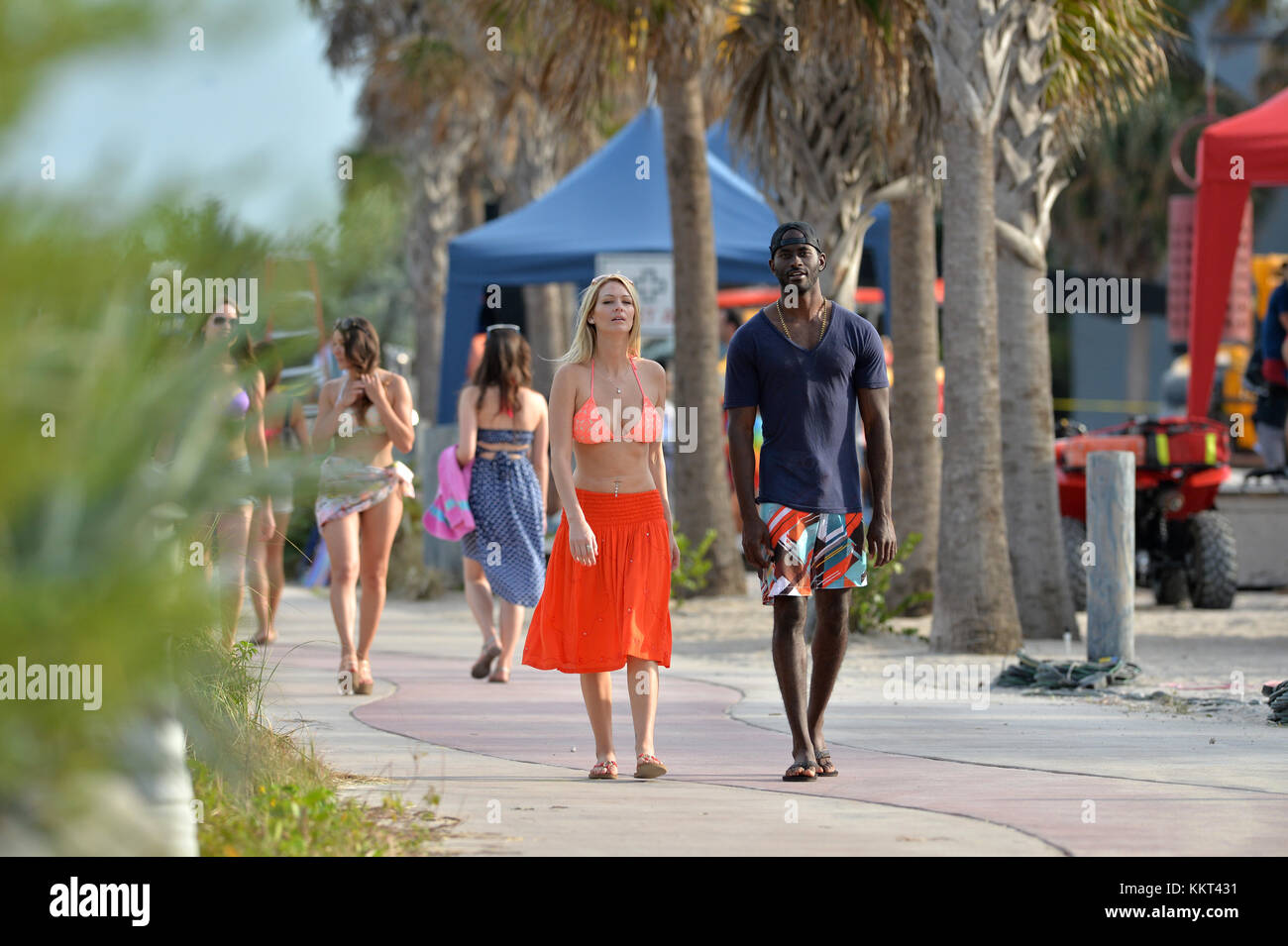 MIAMI BEACH, FL - MARCH 04: Actor's Zac Efron, Dwayne Johnson, Sports Illustrated model Kelly Rohrbach and actress Ilfenesh Hadera on the beach filming a scene for their new movie Baywatch on March 4, 2016 in Miami Beach, Florida.   People:  Atmosphere Stock Photo