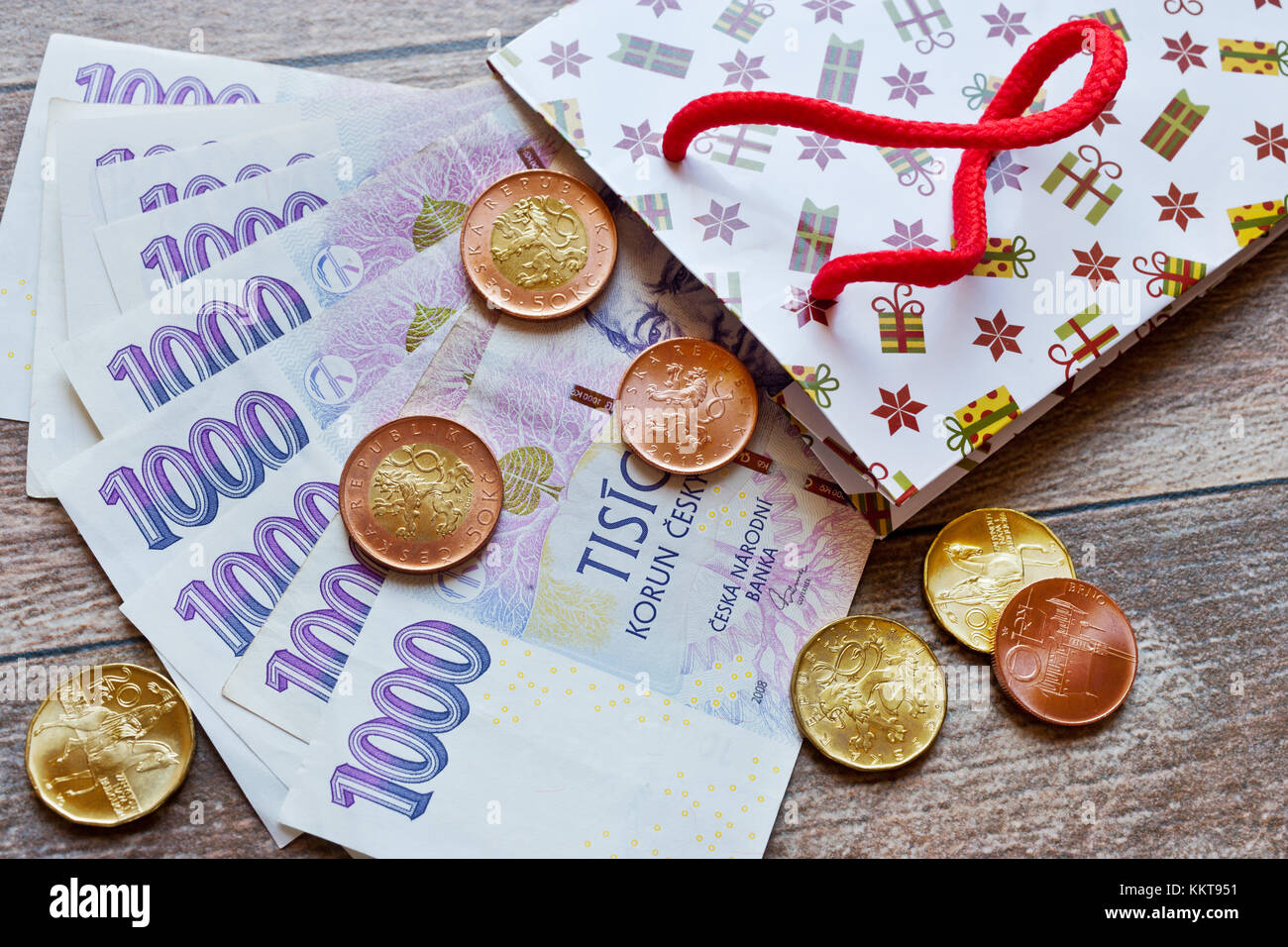 české peníze - bankovky jako dárek / Czech currency - banknotes in gift bags Stock Photo