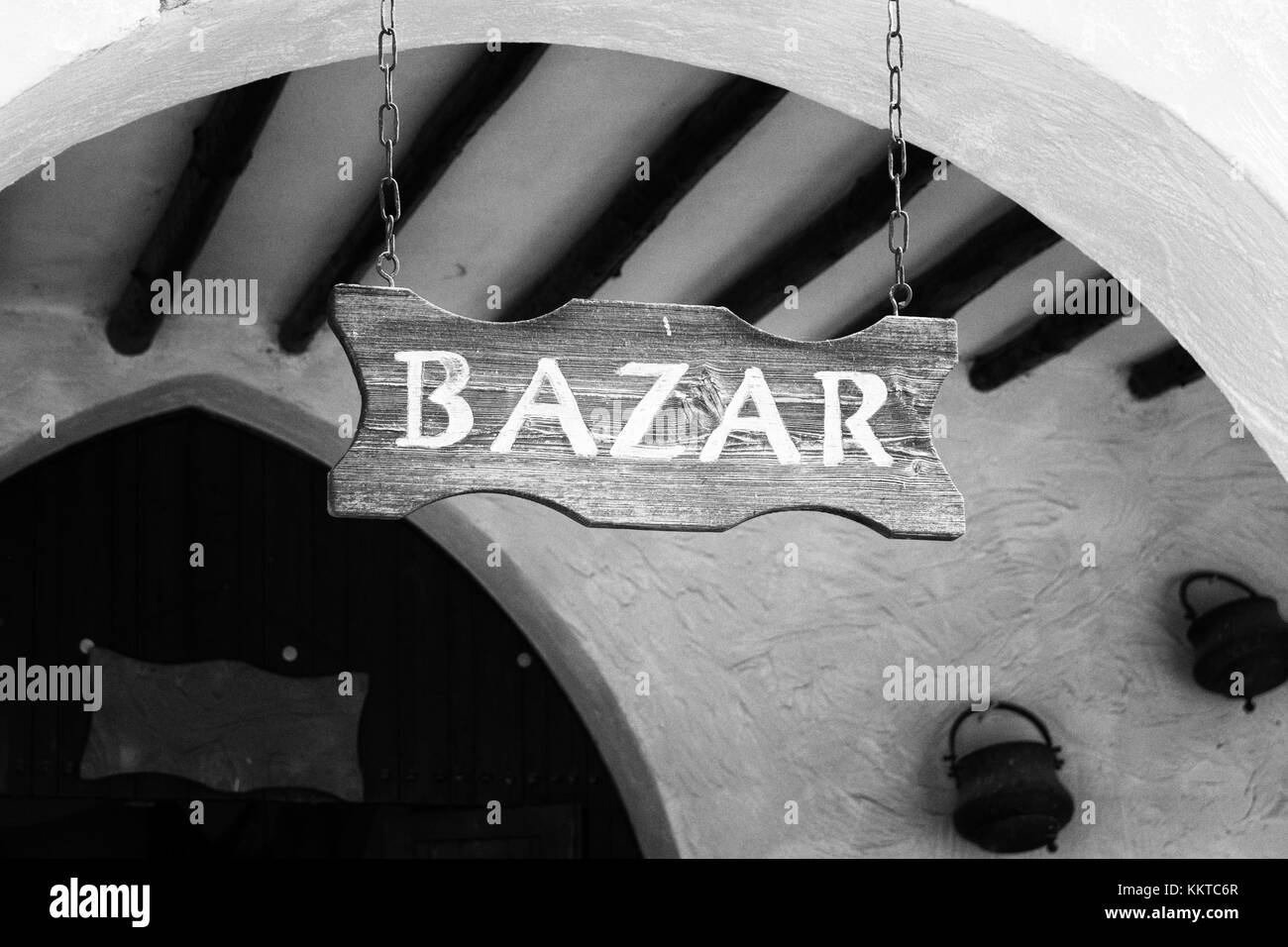 Wood sign at the entrance of an arab market. Stock Photo