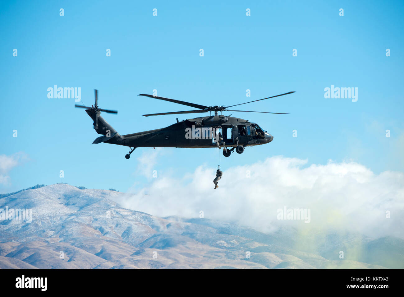 Soldier rappelling out of Black Hawk helicopter at the Gowen Thunder airshow at Gowen Field on October 14 2017 Stock Photo