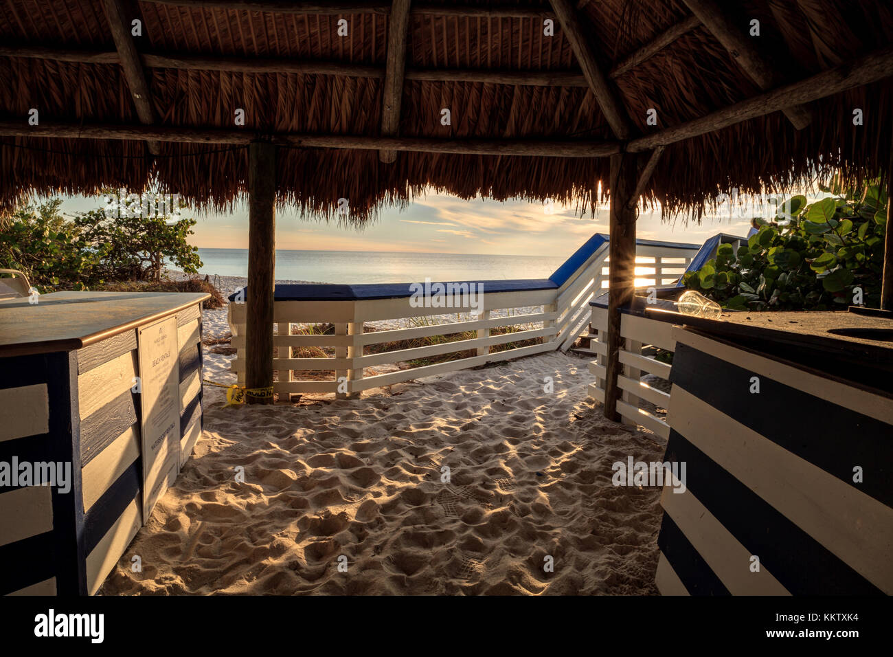 Tiki style tables and chairs on Clam Pass Beach in Naples, Florida, USA Stock Photo Alamy
