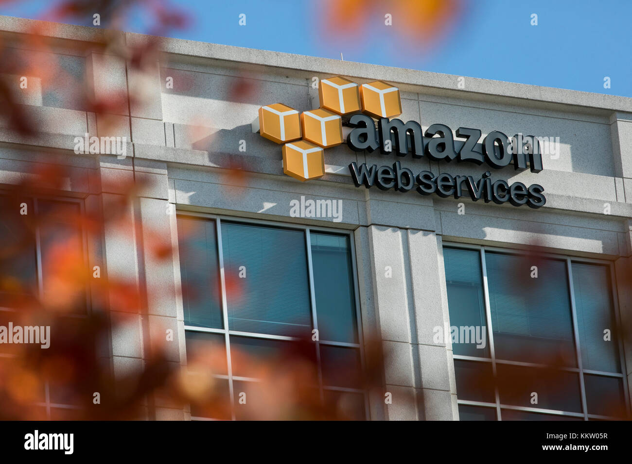 A logo sign outside of a facility occupied by Amazon  Services (AWS