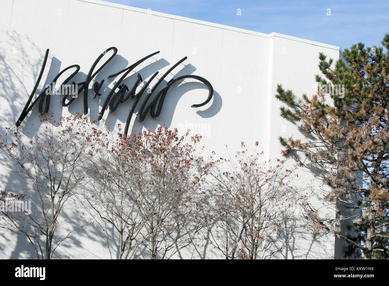 A logo sign outside of a Lord & Taylor retail store location in