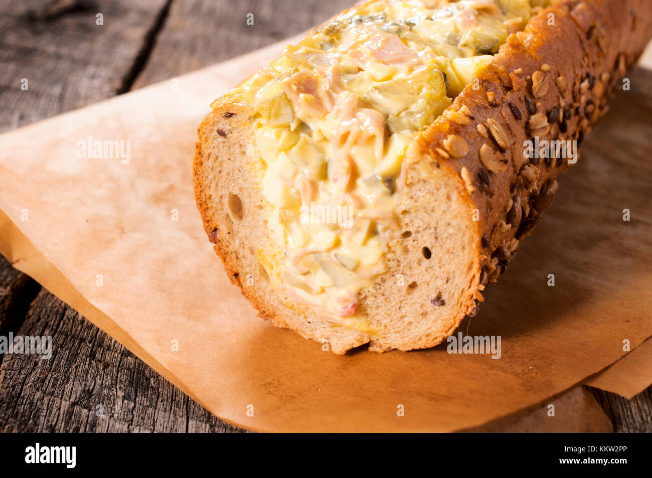 Single sub sandwich on the wooden table Stock Photo