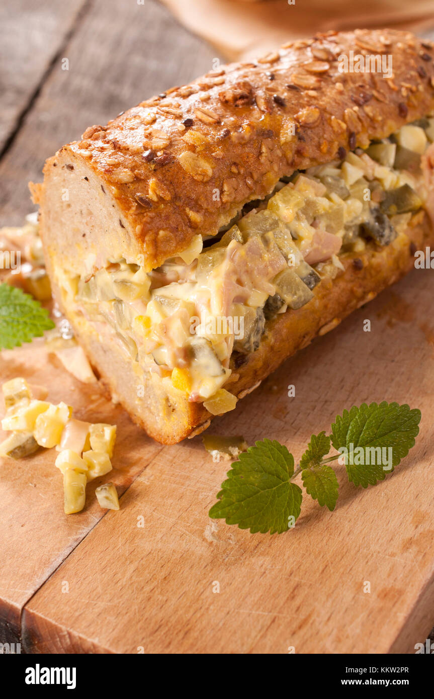 Single sub sandwich with stuffed with gourment salad Stock Photo