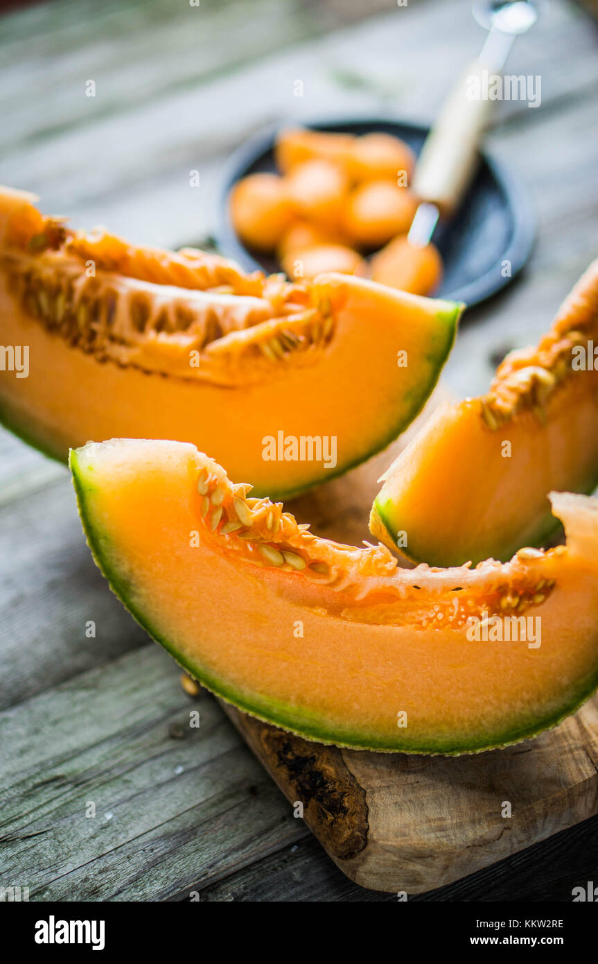 Sliced Melon On Wooden Background Stock Photo