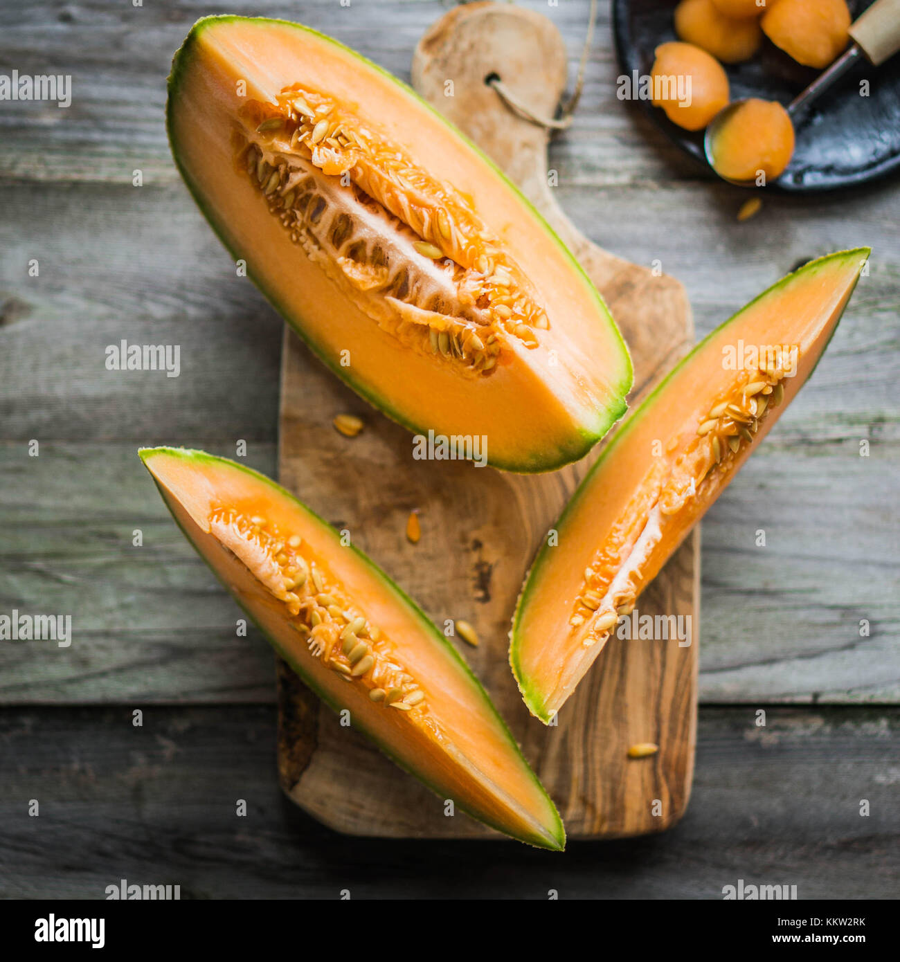 Sliced Melon On Wooden Background Stock Photo
