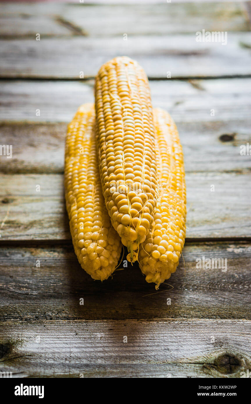Sweet Corn On Rustic Background Stock Photo
