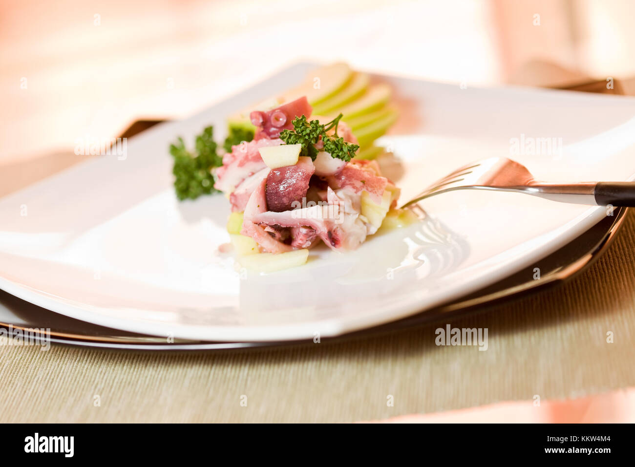 delicious octopus tartare with green appel and parsley Stock Photo