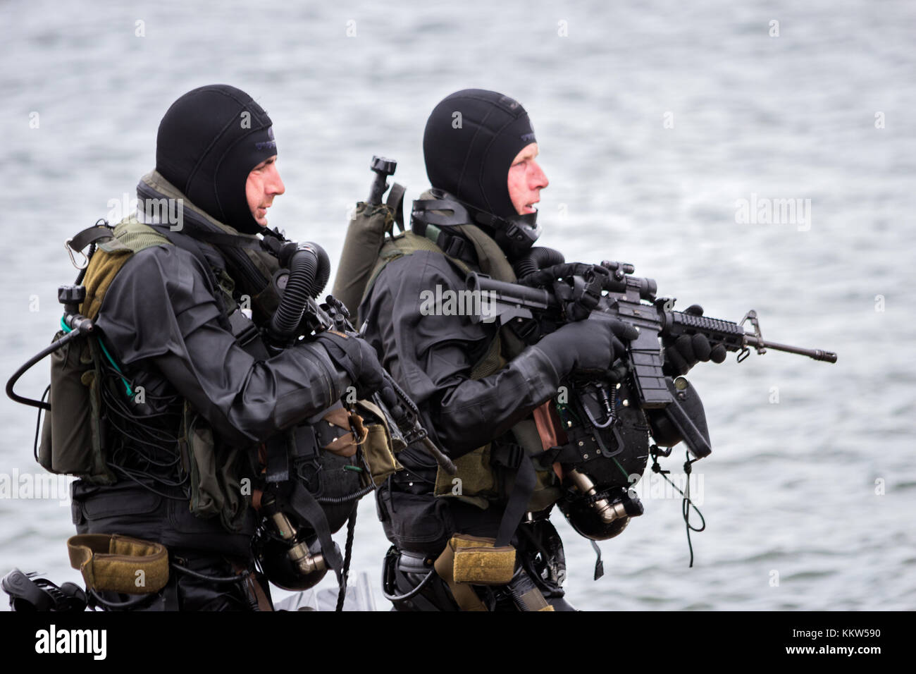 DEN HELDER, THE NETHERLANDS - JUN 23, 2013: Special Forces combat diver during an amphibious assault demo at the Dutch Navy Days. Stock Photo