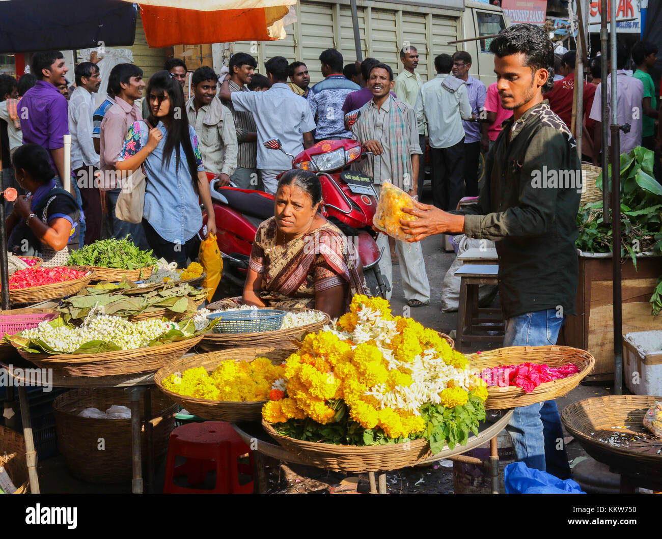 Sellers of marigold garland flowers. Mumbai, India Stock Photo