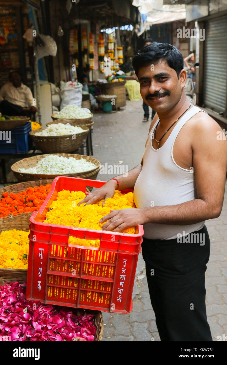 Seller of marigold garland flowers. Mumbai, India Stock Photo